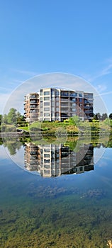 Building reflexion mirror lake sky