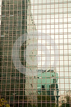 Building reflextions on a modern glass building in Brazil
