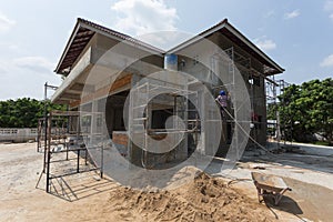 Building residential construction house with scaffold steel