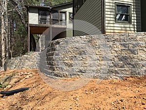 Building a Retaining Wall on the Back of a House photo