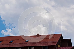 Building rooftop with lightning arrester rod installed