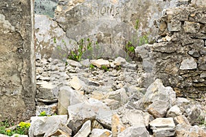 Building of ruins with text Dionis photo