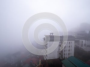 Building in Sapa among Thick Fog