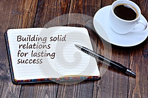 Building solid relations for lasting success on notebook photo