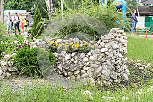 A building of stones in a recreation park for beauty. Blurred background