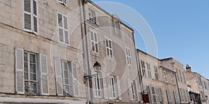 Building in street city seaside of La Rochelle in France in web banner template