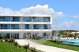 Building and swimming pool at modern luxury hotel