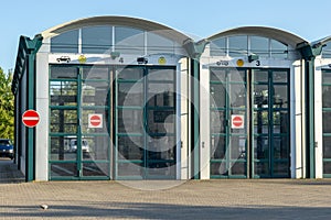 Building of technical supervisory association for cars - hall with large doors