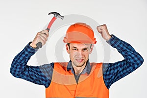 Building tool repair equipment. young worker is engineer assistant. repairman in uniform. man work with hammer. real