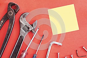 Building tool repair equipments on red background,