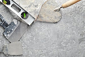 Building tools on a gray concrete background