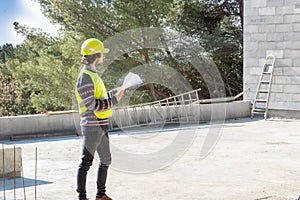 Building training, site visit, apprentice engineer on a construction site of house under construction