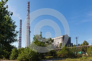 Building and two smoke stacks of thermal power station