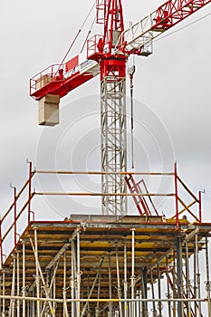 Building under construction. Crane machinery structure. Industry