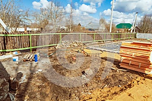 The building is under construction with new foundation after concrete pouring and making reinforcement metal framework