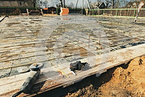 The building is under construction with new foundation after concrete pouring and making reinforcement metal framework
