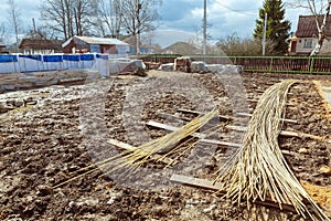 The building is under construction with new foundation after concrete pouring and making reinforcement metal framework