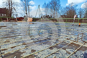 The building is under construction with new foundation after concrete pouring and making reinforcement metal framework