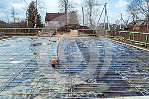 The building is under construction with new foundation after concrete pouring and making reinforcement metal framework