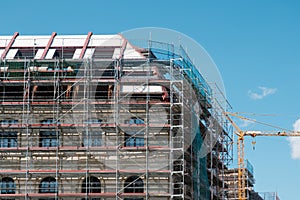 Building under construction / restoration - scaffoling on building facade