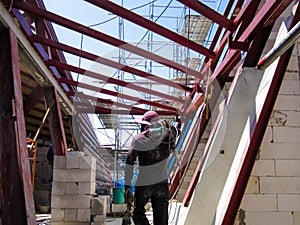 The building is under construction, roof steel frame for building construction, large steel frame.