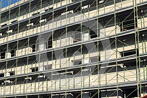 Building under construction with scaffolding