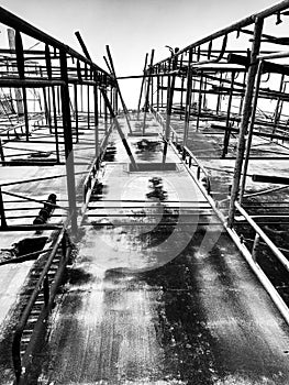Building under construction. Steel bar or steel reinforcement bar in construction site. Construction crane.Black and White and