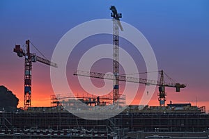 Building under construction at sunset. Night scenes