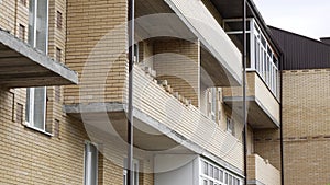 Building with an unfinished destroyed balcony. Stavropol, Russia, 01.09.2020