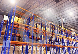 Building warehouse. Rows of shelves with cargo pallet in the warehouse storage