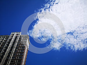 A building and the white clouds