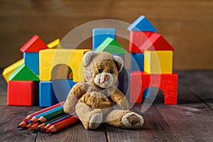 Building from wooden colourful childrens blocks