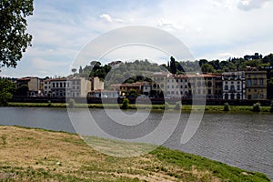 Buildings along the river in italy photo