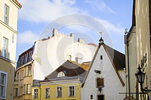 Buildings and architecture exterior view in old town of Tallinn, colorful old style houses and street situation. Tallinn, Estonia