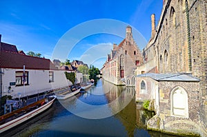 Buildings in a canal, Bruge, Belgium photo