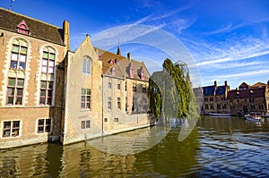 Buildings in a canal, Bruge, Belgium photo