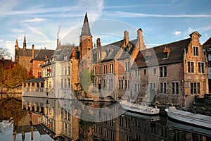 Buildings On Canal In Brugges, Belgium photo