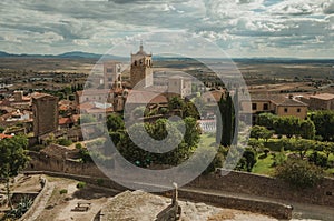 Buildings with church steeples and courtyard seen from the Castle of Trujillo