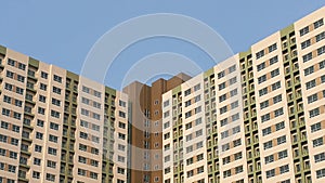 Buildings construction pattern in city background blue sky.