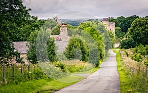 Buildings by a country lane