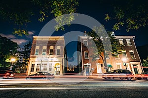 Buildings on Fairfax Street at night, in the Old Town of Alexandria, Virginia. photo