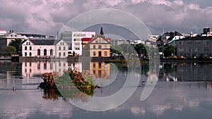 Buildings in lake Tjornin, Reykjavik.