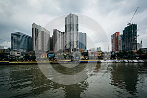 Buildings in Mandaluyong and the Pasig River, in Makati, Metro M