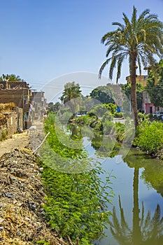 Buildings on the Nile canal near Qena, Egypt