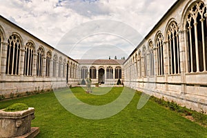 Buildings of Pisa, Italy. Medieval Crusade Cementer, Pisa Italy. View of Pisa from Cementery. Pisa - Camposanto interior