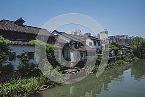 Buildings by river in Hangzhou, China