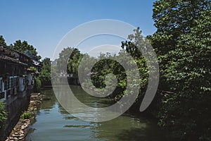 Buildings by river in Hangzhou, China