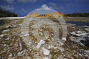 Buildings and rocky shoreline in Bonaire