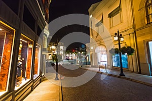 Buildings in Rodeo Drive at night