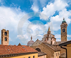 Buildings and roofs of main sightseeing spots of upper town of Bergamo, Italy. Basilica of Santa Maria Maggiore,Cappella Colleon